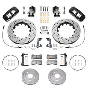 Wilwood rear AERO4 brake kit for Corvette C8 service and parking brakes: Pair of black AERO4 service calipers, separate EPB calipers, drilled and slotted rotor rings, silver hats, hoses, pads, brackets and fasteners laid out.