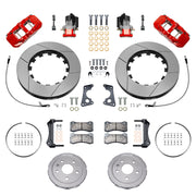 Wilwood rear AERO4 brake kit for Corvette C8 service and parking brakes: Pair of red-finish AERO4 service calipers, separate EPB calipers, slotted rotor rings, silver hats, hoses, pads, brackets and fasteners laid out.