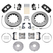 Wilwood rear AERO4 brake kit for Corvette C8 service and parking brakes: Pair of black AERO4 service calipers, separate EPB calipers, slotted rotor rings, silver hats, hoses, pads, brackets and fasteners laid out.
