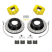 Wilwood Porsche 911 (1969–1983) rear 11.42 × 0.80-inch srp drilled & slotted brake kit layout with yellow D31 calipers and rotors, pads and fasteners, with braided hoses