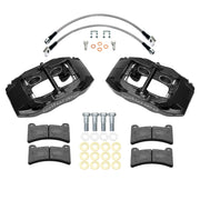 Wilwood black DPC56 rear caliper kit for Corvette C5, laid out with pads, flexlines, washers and mounting hardware