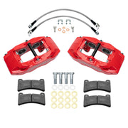 Wilwood red DPC56 rear caliper kit for Corvette C5, laid out with pads, flexlines, washers and mounting hardware
