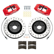 Wilwood Corvette C5 front brake kit with red SLC56 calipers and 12.80-inch drilled and slotted rotors, laid out with pads, flexlines, washers and mounting hardware