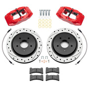 Wilwood Corvette C6 Base rear brake kit with red DPC56 calipers and 12.01-inch drilled and slotted rotors, laid out with pads, flexlines, washers and mounting hardware