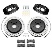 Wilwood Corvette C6 Base rear brake kit with black DPC56 calipers and 12.01-inch drilled and slotted rotors, laid out with pads, flexlines, washers and mounting hardware