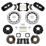 Wilwood Chevrolet and GMC C1500 rear brake kit with black AERO4 calipers and 14.00-inch drilled and slotted rotors, laid out with parking-shoe assemblies, hats, pads, brackets and fasteners