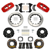 Wilwood Chevrolet and GMC C1500 rear brake kit with red AERO4 calipers and 14.00-inch slotted rotors, laid out with parking-shoe assemblies, hats, pads, brackets and fasteners
