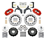 Wilwood Chevrolet full-size drum-spindle front brake kit with red Superlite 6R calipers and 12.88-inch drilled and slotted rotors, laid out with hats, hubs, bearings, seals, pads, brackets and hardware