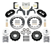 Wilwood Chevrolet full-size drum-spindle front brake kit with black Superlite 6R calipers and 12.88-inch slotted rotors, laid out with hats, hubs, bearings, seals, pads, brackets and hardware