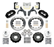 Wilwood listed Chevrolet full-size and Corvette spindle front brake kit with black Superlite 6R calipers and 12.88-inch slotted rotors, laid out with hats, hubs, bearings, seals, pads, brackets and fasteners