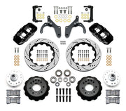 Wilwood listed Chevrolet full-size and Corvette spindle front brake kit with black AERO6 calipers and 14.00-inch drilled and slotted rotors, laid out with hats, hubs, bearings, seals, pads, brackets and fasteners
