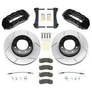 Wilwood Ram 2500 and 3500 rear brake kit with black TX6R calipers and 16.00-inch slotted rotors, laid out with pads, caliper brackets, flexlines and mounting hardware