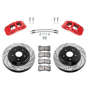Wilwood Ram 1500 2WD front brake kit with red AERODM calipers and 13.38-inch drilled and slotted rotors, laid out with pads, braided hoses and mounting fasteners