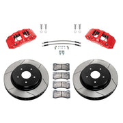 Wilwood Ram 1500 2WD front brake kit with red AERODM calipers and 13.38-inch slotted rotors, laid out with pads, braided hoses and mounting fasteners