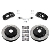 Wilwood Ram 1500 2WD front brake kit with black AERODM calipers and 13.38-inch slotted rotors, laid out with pads, braided hoses and mounting fasteners