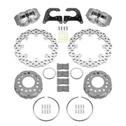 Wilwood Big Ford 2.36-inch rear drag kit laid out with two anodized XRD calipers, drilled scalloped rotors, dynamic hats, retaining rings, pads, brackets and fasteners