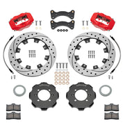 Wilwood Mazda Miata NA/NB front brake kit with red Dynalite calipers and 11.75-inch drilled and slotted rotors, laid out with hats, rotors, pads, flexlines, caliper brackets and fasteners