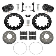 Wilwood Can-Am Maverick R front brake kit with black NDPR calipers and 11.60-inch drilled rotors, laid out with dynamic hats, retaining rings, pads, brackets and hardware