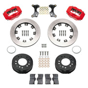 Wilwood aluminum ProSpindle front brake kit with red Dynalite calipers and 12.19-inch plain rotors, laid out with hats, registration rings, pads, brackets and fasteners