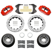 Wilwood aluminum ProSpindle front brake kit with red FNSL6R calipers and 12.88-inch drilled and slotted rotors, laid out with hats, registration rings, pads, brackets and fasteners