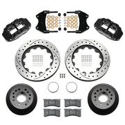 Wilwood aluminum ProSpindle front brake kit with black FNSL6R calipers and 14.00-inch drilled and slotted rotors, laid out with hats, registration rings, pads, brackets and fasteners