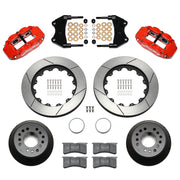 Wilwood aluminum ProSpindle front brake kit with red FNSL6R calipers and 14.00-inch slotted rotors, laid out with hats, registration rings, pads, brackets and fasteners