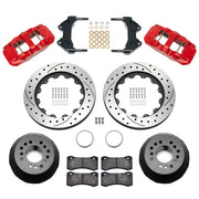 Wilwood aluminum ProSpindle front brake kit with red AERO6 calipers and 14.00-inch drilled and slotted rotors, laid out with hats, registration rings, pads, brackets and fasteners