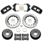 Wilwood aluminum ProSpindle front brake kit with black AERO6 calipers and 14.00-inch drilled and slotted rotors, laid out with hats, registration rings, pads, brackets and fasteners