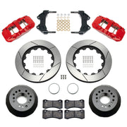 Wilwood aluminum ProSpindle front brake kit with red AERO6 calipers and 14.00-inch slotted rotors, laid out with hats, registration rings, pads, brackets and fasteners