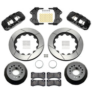 Wilwood aluminum ProSpindle front brake kit with black AERO6 calipers and 15.00-inch slotted rotors, laid out with hats, registration rings, pads, brackets and fasteners