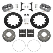Wilwood Can-Am Maverick R front brake kit with anodized NDPR calipers and 11.60-inch plain rotors, laid out with dynamic hats, retaining rings, pads, brackets and hardware
