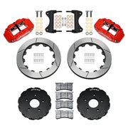 Components laid out for the Wilwood front FNSL6R brake kit for Chevrolet Corvette C7, GT-slotted rotors and red powder coat calipers