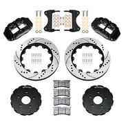 Components laid out for the Wilwood front FNSL6R brake kit for Chevrolet Corvette C7, SRP drilled and slotted rotors and black powder coat calipers