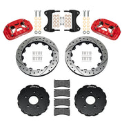 Components laid out for the Wilwood front XRS6R brake kit for Chevrolet Corvette C7, SRP drilled and slotted rotors and red powder coat calipers