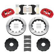 Components laid out for the Wilwood front XRS6R brake kit for Chevrolet Corvette C7, GT-slotted rotors and red powder coat calipers