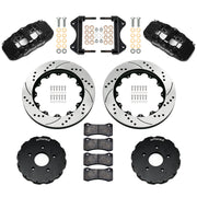 Components laid out for the Wilwood front AERO6 brake kit for Chevrolet Corvette C7, SRP drilled and slotted rotors and black powder coat calipers
