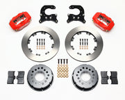 Components laid out for the Wilwood rear Dynalite Pro Series brake kit for Oldsmobile/Pontiac Housing Ends, plain face rotors and red powder coat calipers
