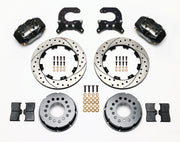 Components laid out for the Wilwood rear Dynalite Pro Series brake kit for Chevrolet 12-Bolt C-Clip Axles, SRP drilled and slotted rotors and black powder coat calipers