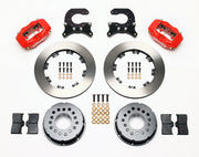Components laid out for the Wilwood rear Dynalite Pro Series brake kit for Chevrolet 12-Bolt C-Clip Axles, plain face rotors and red powder coat calipers