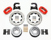 Components laid out for the Wilwood rear Dynalite Pro Series brake kit for Big Ford Housing Ends, 2.54-Inch Offset, SRP drilled and slotted rotors and red powder coat calipers