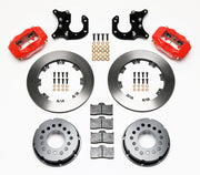 Components laid out for the Wilwood rear Dynalite Pro Series brake kit for Big Ford Housing Ends, 2.36-Inch Offset, plain face rotors and red powder coat calipers