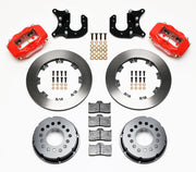 Components laid out for the Wilwood rear Dynalite Pro Series brake kit for Mopar/Dana Axles, 2.36-Inch Offset, plain face rotors and red powder coat calipers