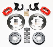 Components laid out for the Wilwood rear Dynalite Pro Series brake kit for New-Style Big Ford Ends, 2.50-Inch Offset, plain face rotors and red powder coat calipers
