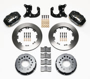 Components laid out for the Wilwood rear Dynalite Pro Series brake kit for Ford Mustang 8.8-Inch Five-Lug Axles, plain face rotors and black powder coat calipers