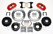 Wilwood rear Superlite 4R kit for Special Chevy 12-Bolt 3.15-Inch-Bearing Axles, 2.81-Inch Offset, red calipers and 12.88-inch gt slotted rotors laid out, with internal parking-brake assemblies