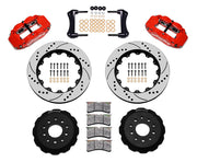 Wilwood red FNSL6R front brake kit with 14.00-inch drilled and slotted rotors, calipers and mounting components laid out