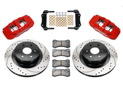 Wilwood red AERO4 rear brake kit with 14.25-inch drilled and slotted rotors, calipers and mounting components laid out