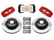 Wilwood red AERO4 rear brake kit with 14.25-inch slotted rotors, calipers and mounting components laid out