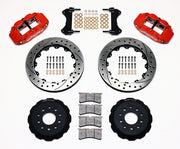 Wilwood red FNSL6R front brake kit with 13.06-inch drilled and slotted rotors, calipers and mounting components laid out