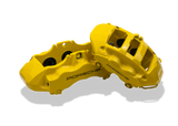 Brembo 6-Piston Caliper Restoration for Porsche Cayenne with factory seals, preserved anodizing, zinc plating, 4-step paint, and transfer decals.
